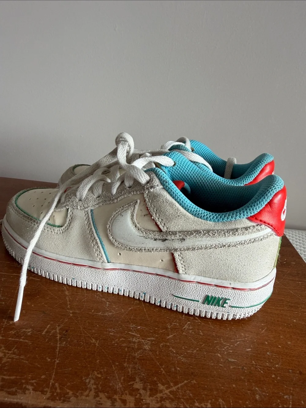 Nike Kids Off-White Sneakers with Teal Lining and Red Heel